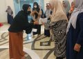 Majelis Taklim Wanita Wajib Membangun Balikpapan. Hj Nurlena Bagi Sedekah, Mantan Artis Peggy Melati Sukma Hadir Bercadar di Balikpapan